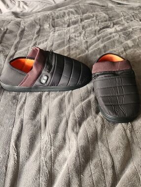 Unisex Quilted Slip-On Indoor/Outdoor Heated Slipper- Black with Orange Lining
